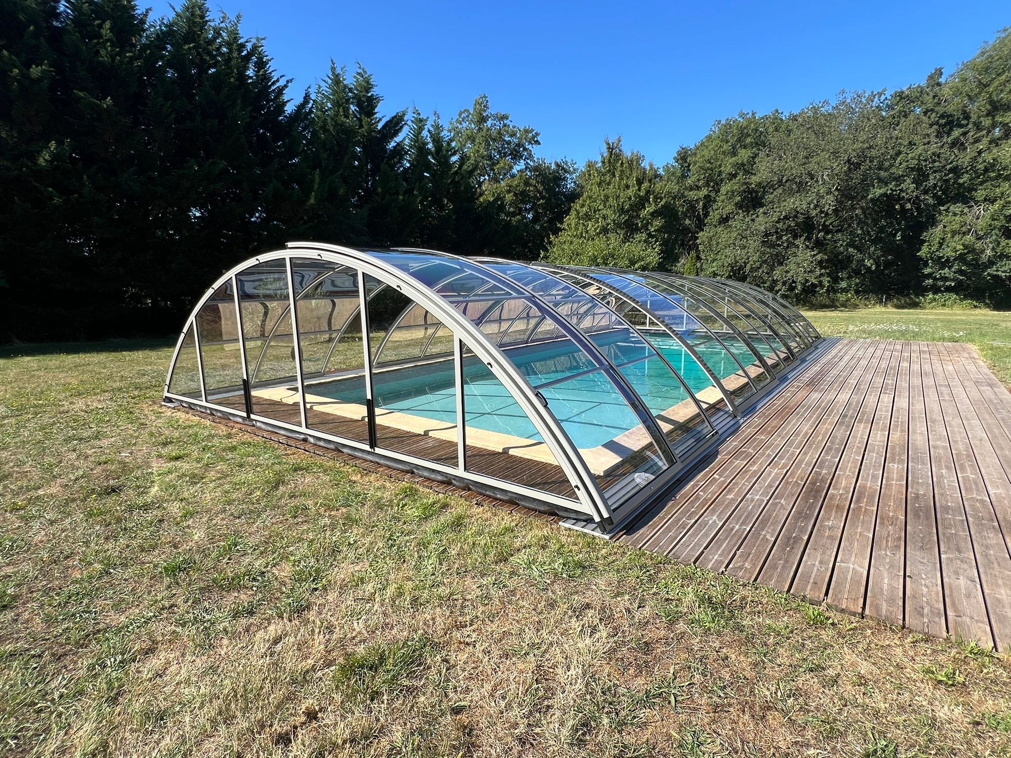 Abri de piscine mi haut super Abri de piscine mi haut super