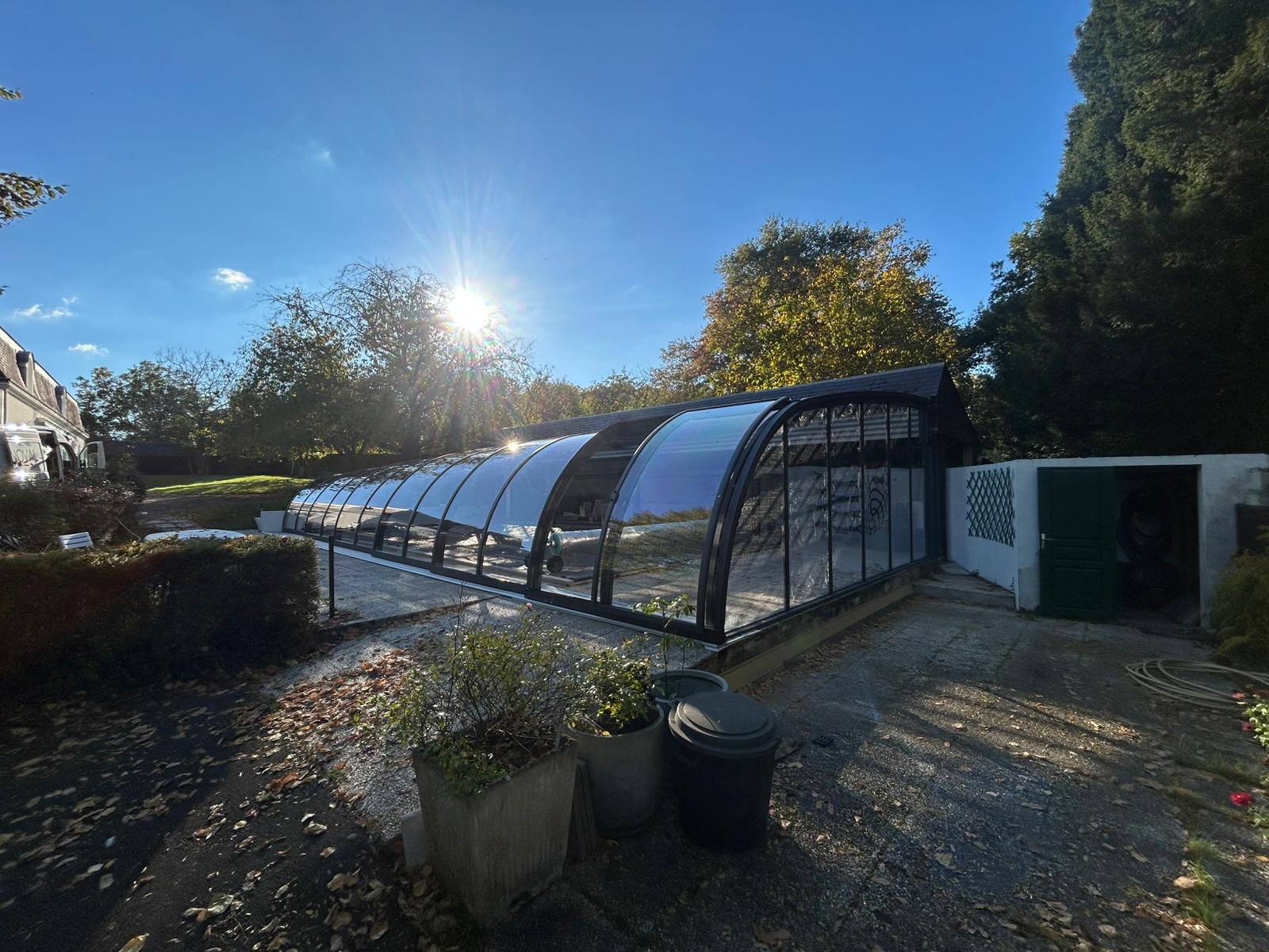 Abri de terrasse pans arrondis Abri de terrasse pans arrondis